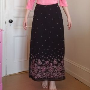 Floor length black skirt with flowers